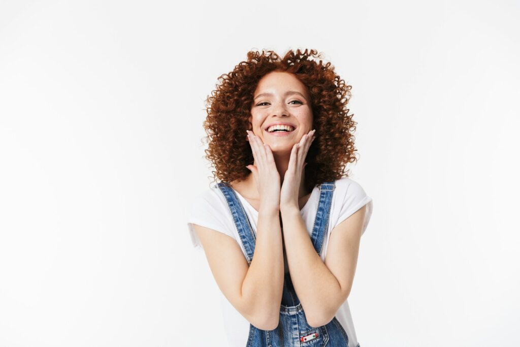 femme souriante dentition parfaite