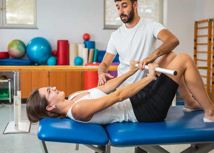Rehabilitation treatment with medical bar